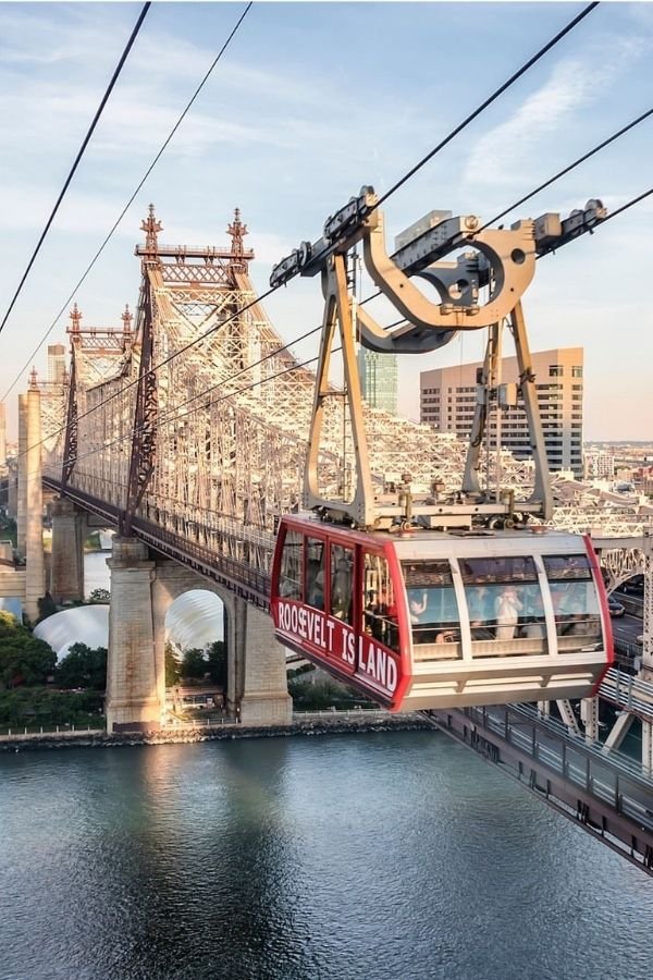 Roosevelt Island Tramway. Crossing the Queensboro Bridge. A budget friendly way to see the famous Manhattan skyline. 