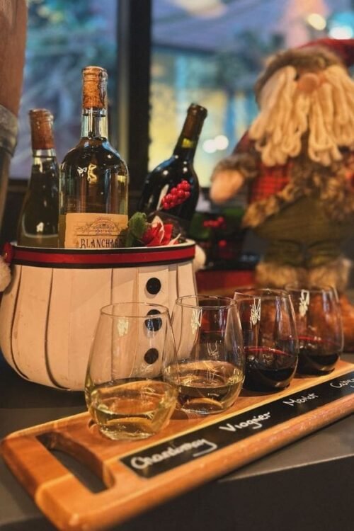 Hometown Christmas bucket list item - A bottle of wine and tasting flight to enjoy in the festively decorated wintery.