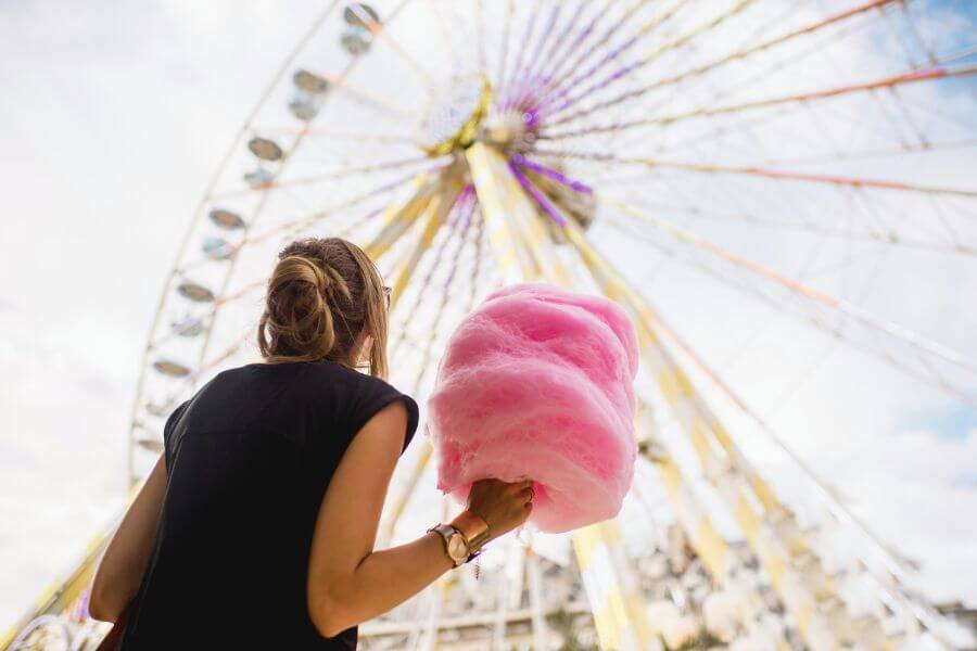 amusement park with Ferris wheel and cotton candy