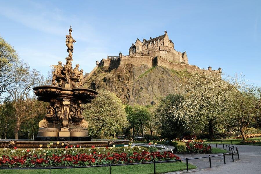 ross fountain, princes street gardens, Edinburgh castle, flowers, fortified walls, solo female travellers