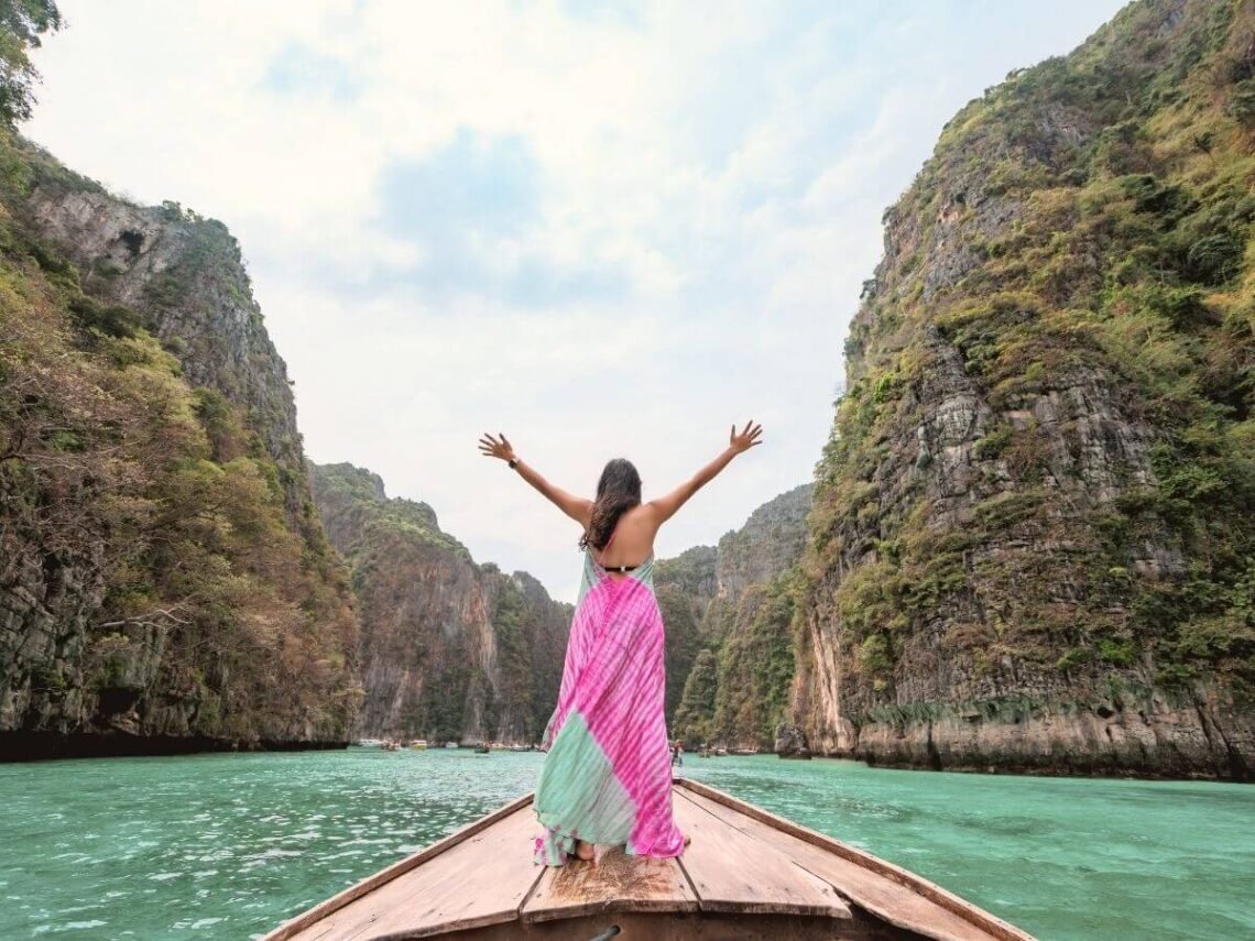 incredible Thailand travel itinerary, girl on boat, south thialand